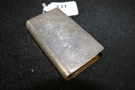 A mid 19th century continental silver double lidded snuff box, modelled as a book, 5.5 oz.